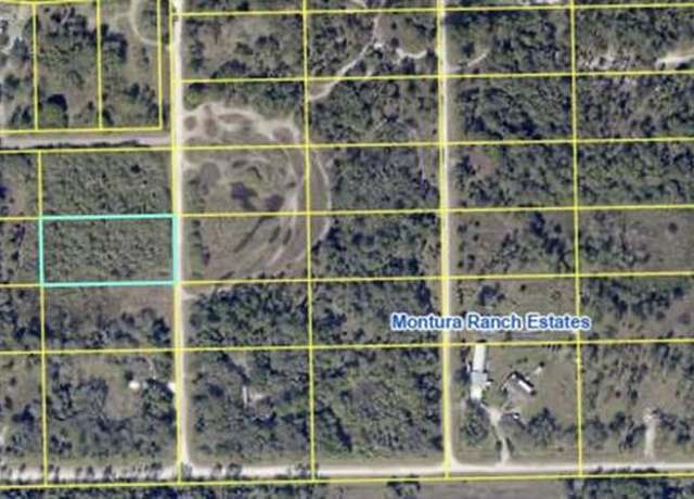 Property at 660 S Coral St, Montura Ranches, FL 33440