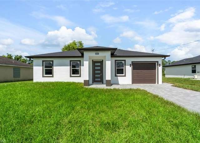 Property at 722 Castlestone Ave S, Lehigh Acres, FL 33974, 3 beds, 3 baths