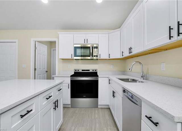 Property at 876 Apartment St E, Lehigh Acres, FL 33974, 6 beds, 4 baths
