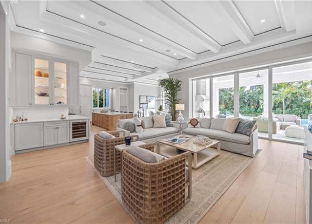 Property at 696 Fountainhead Ln, Naples, FL 34103, 4 beds, 4.5 baths
