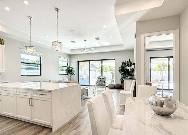 Property at 828 100th Ave N, Naples, FL 34108, 4 beds, 4 baths