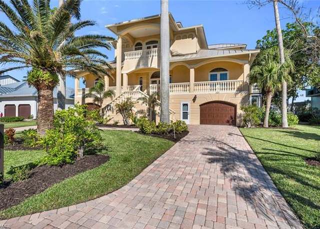 Property at 223 Dolphin Cove Ct, Bonita Springs, FL 34134, 4 beds, 4 baths