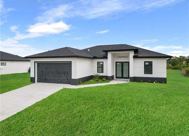 Property at 2911 37th St W, Lehigh Acres, FL 33972, 3 beds, 2 baths