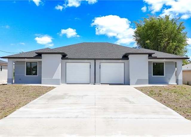 Property at 847 Duplex St E, Lehigh Acres, FL 33974, 6 beds, 4 baths