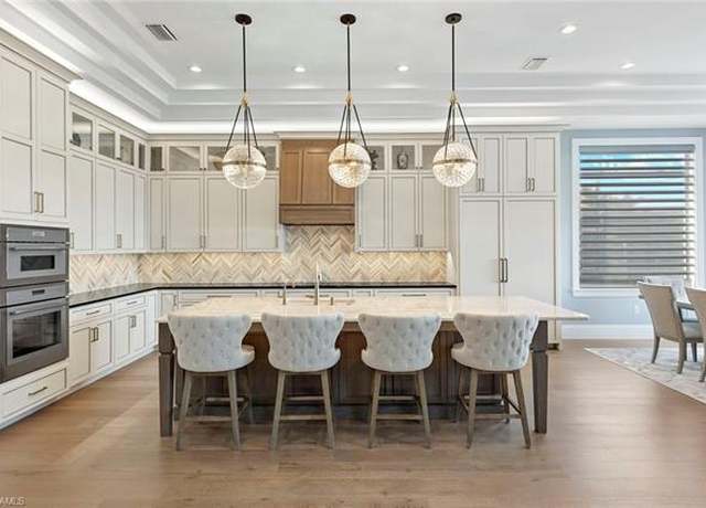 Property at 211 San Mateo Dr, Bonita Springs, FL 34134, 4 beds, 4 baths
