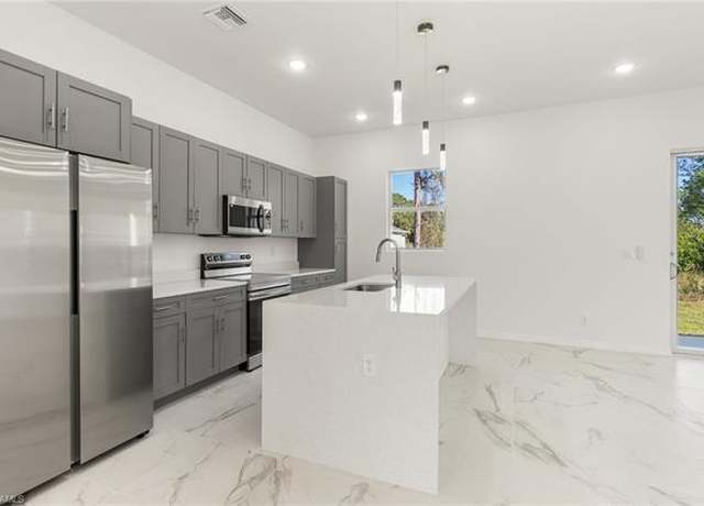 Property at 1918 Wanda Ave N, Lehigh Acres, FL 33971, 4 beds, 2 baths