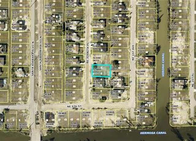 Property at 909 NE Juanita Pl, Cape Coral, FL 33909