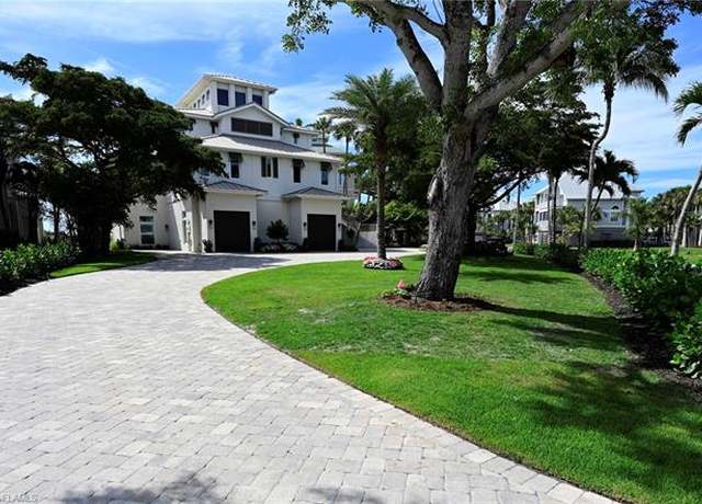 Property at 104 Anguilla Ln, Bonita Springs, FL 34134, 6 beds, 7.5 baths
