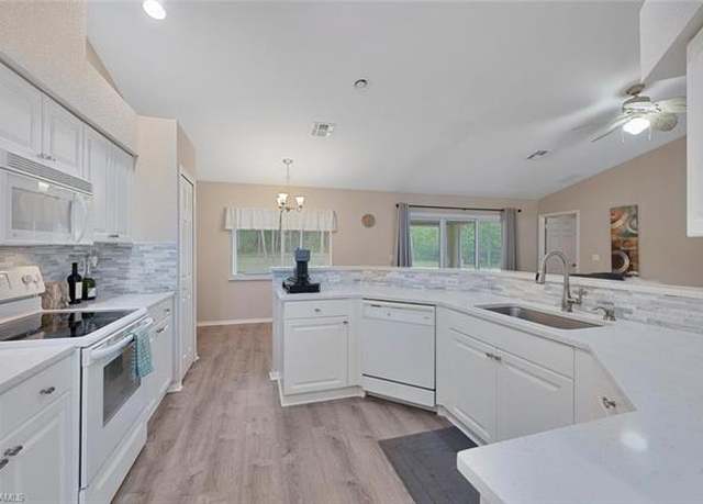 Property at 2061 16th Ave SW, Naples, FL 34117, 3 beds, 2 baths