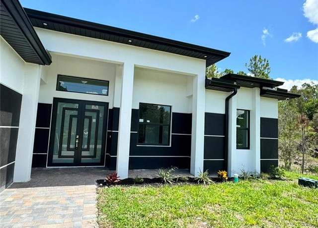 Property at 1231 Racoon St E, Lehigh Acres, FL 33974, 3 beds, 2 baths