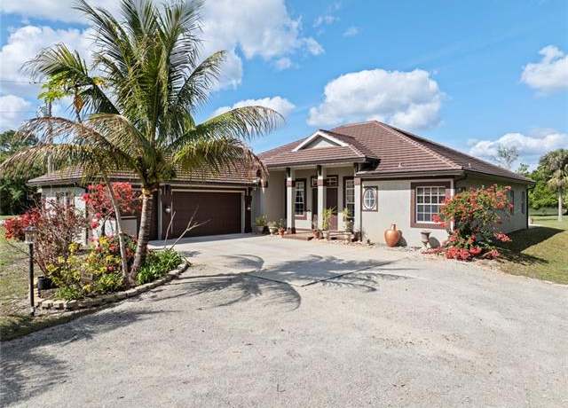 Property at 2671 72nd Ave NE, Naples, FL 34120, 4 beds, 3 baths