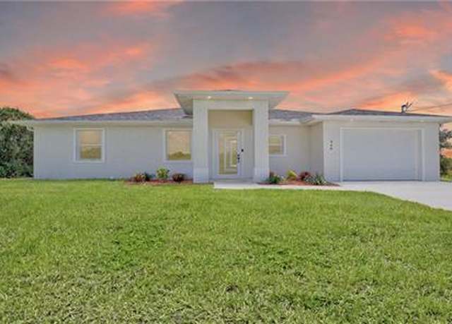 Property at 928 Grant Blvd, Lehigh Acres, FL 33974, 3 beds, 2 baths