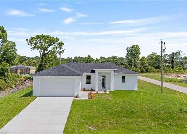 Property at 938 Grant Blvd, Lehigh Acres, FL 33974, 3 beds, 2 baths