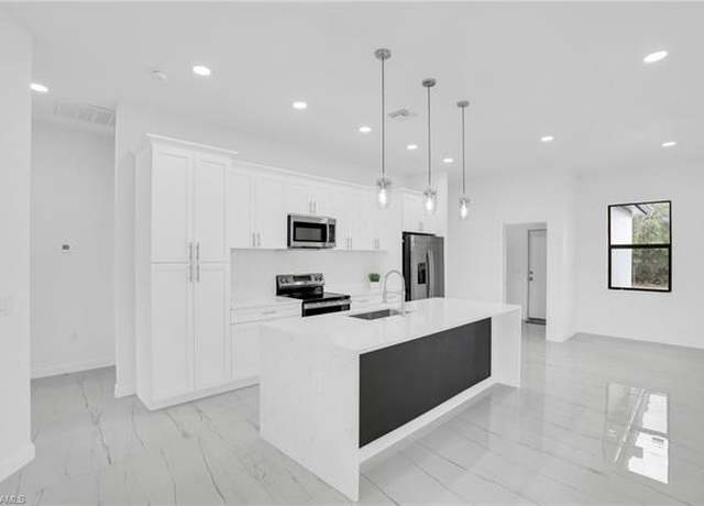 Property at 2604 73rd St W, Lehigh Acres, FL 33971, 3 beds, 2 baths