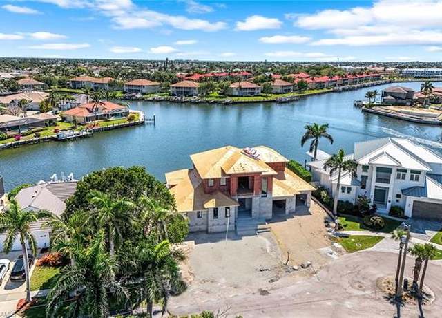 Property at 239 Bass Ct, Marco Island, FL 34145, 4 beds, 4 baths