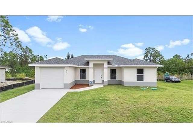 Property at 919 Hepburn Ave, Lehigh Acres, FL 33974, 3 beds, 2 baths
