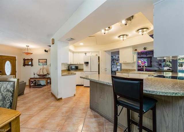Property at 813 105th Ave N, Naples, FL 34108, 3 beds, 2 baths