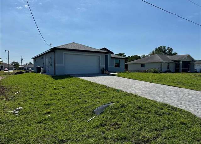 Property at 916 Apple Ave, Lehigh Acres, FL 33971, 4 beds, 3 baths