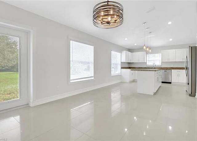 Property at 380 13th St NW, Naples, FL 34120, 4 beds, 3 baths