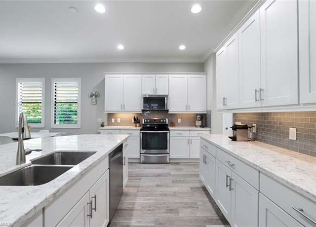 Property at 4167 Raffia Dr, Naples, FL 34119, 4 beds, 3.5 baths