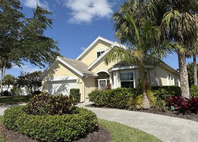 Property at 7539 Berkshire Pines Dr, Naples, FL 34104, 4 beds, 3 baths