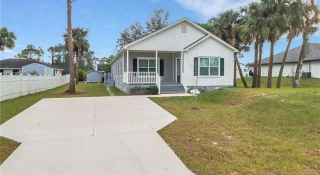 Property at 838 Porter St E, Lehigh Acres, FL 33974, 4 beds, 2.5 baths