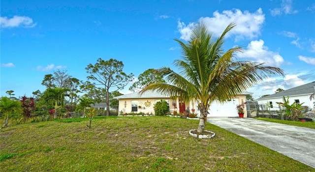 Photo of 2432 Ted Ave S, Lehigh Acres, FL 33973
