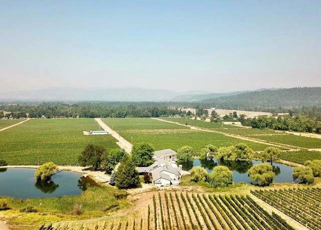 Property at 7821 Holland Loop Rd, Cave Junction, OR 97523, 5 beds, 4.5 baths