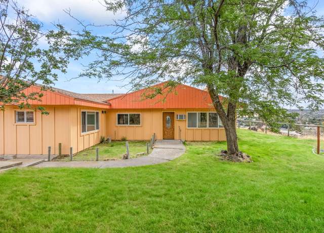 Property at 825 NW 3rd St, Madras, OR 97741, 3 beds, 2 baths