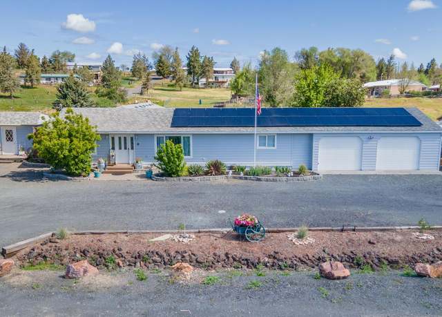 Property at 1048 SW Colfax Ln, Madras, OR 97741, 3 beds, 2.5 baths