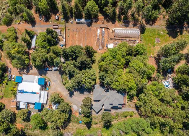 Property at 118 Airport Dr, Cave Junction, OR 97523, 4 beds, 3 baths