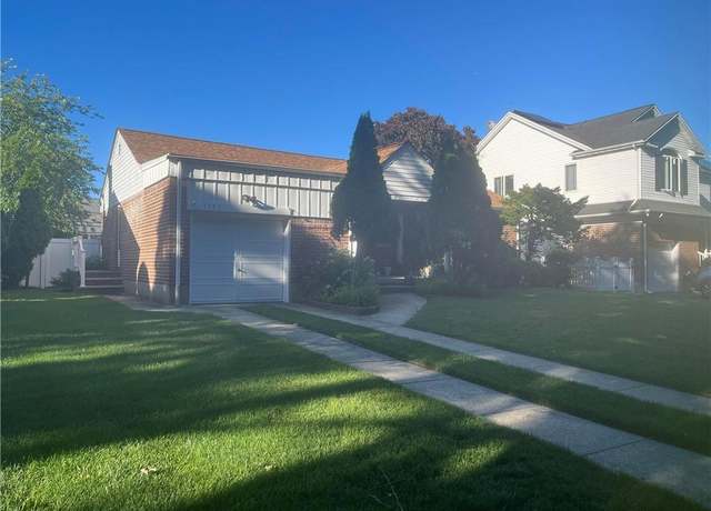Property at 1702 Greenway Blvd, Elmont, NY 11003, 4 beds, 2 baths