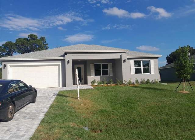 Property at 1841 SW Mackenzie St, Port Saint Lucie, FL 34953, 4 beds, 3 baths