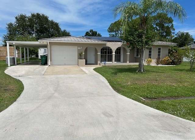 Property at 1691 SE Grapeland Ave, Port St Lucie, FL 34952, 2 beds, 2 baths