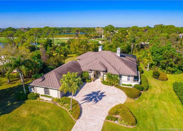 Property at 13407 NW Wax Myrtle Trl, Palm City, FL 34990, 4 beds, 4.5 baths