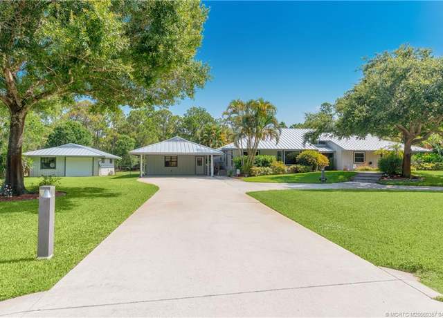 Property at 11245 SW Meadowlark Cir, Stuart, FL 34997, 4 beds, 2.5 baths
