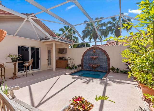 Property at 13309 NW Maplewood Rd, Palm City, FL 34990, 3 beds, 3.5 baths