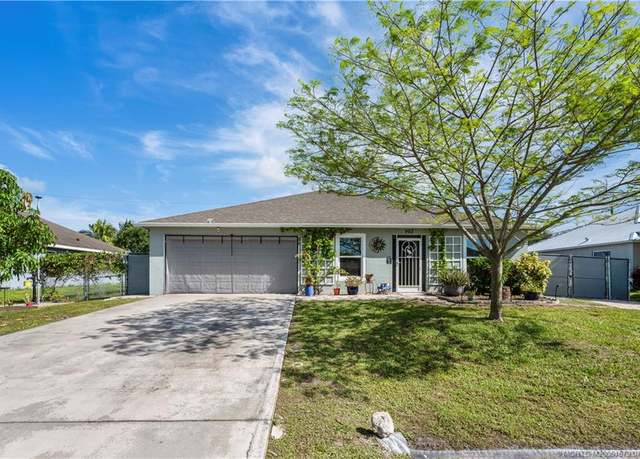 Property at 962 SW Mcelroy Ave, Port St Lucie, FL 34953, 3 beds, 2 baths