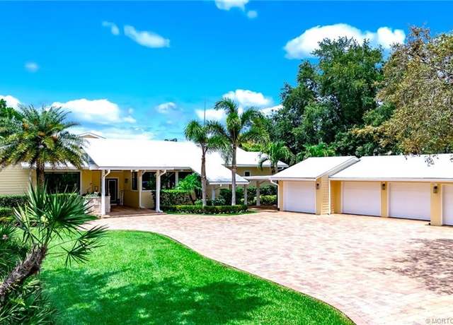 Property at 1819 SW Crane Creek Ave, Palm City, FL 34990, 4 beds, 4.5 baths