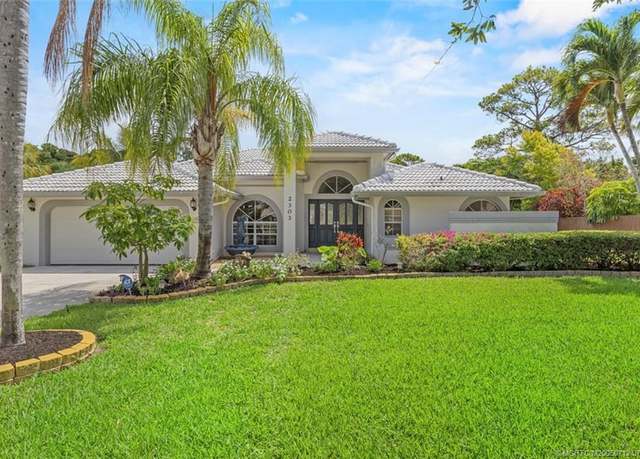 Property at 2303 NE Marlberry Ln, Jensen Beach, FL 34957, 4 beds, 2.5 baths