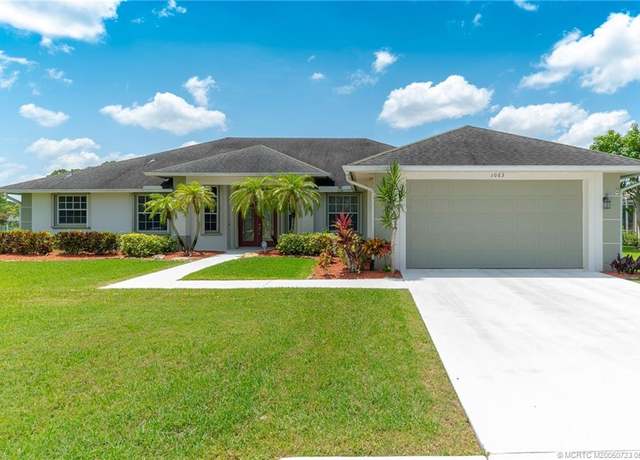 Property at 1063 SW Sand Oak Dr, Palm City, FL 34990, 4 beds, 3 baths