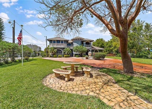 Property at 10305 S Indian River Dr, Fort Pierce, FL 34982, 4 beds, 3.5 baths