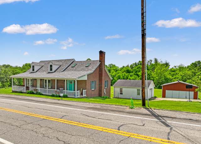 Property at 9689 Main St, Hustonville, KY 40437, 4 beds, 2 baths