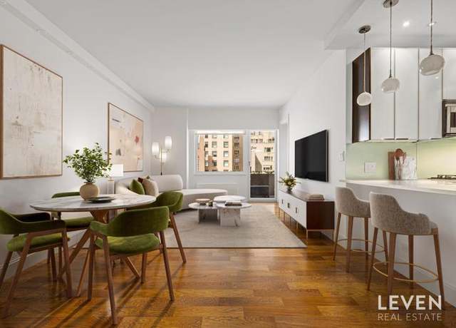 Property at 58 W 58th St Unit 11A, New York City, NY 10019, 2 beds, 2 baths