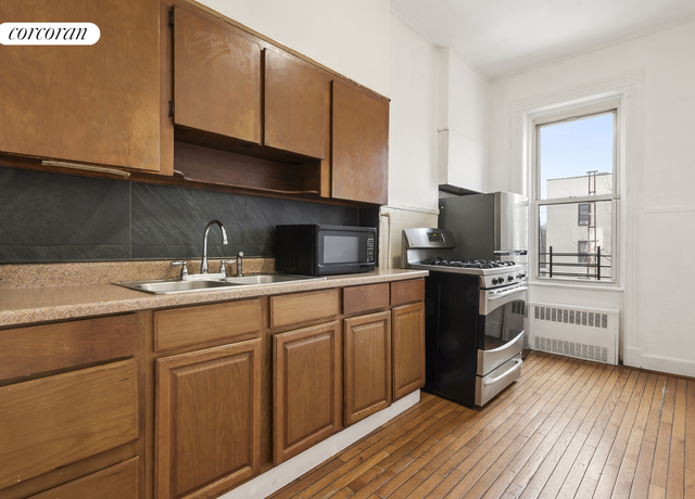 Property at 62-60 60th St, New York City, NY 11385, 5 beds, 3 baths