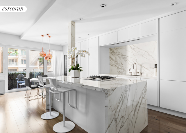 Property at 58 W 58th St Unit 7A, New York City, NY 10019, 1 bed, 1.5 baths