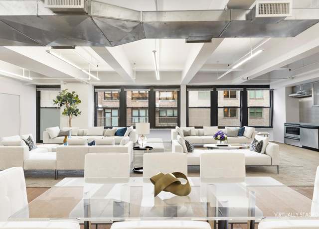 Property at 315 W 36th St Unit 12B, New York City, NY 10018, 1 bed, 1.5 baths