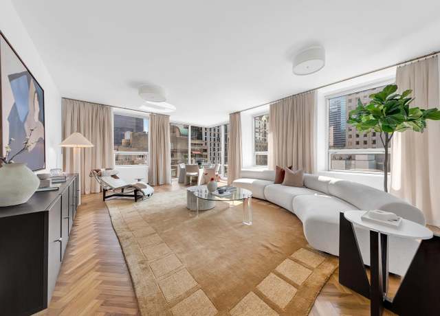 Property at 15 W 53rd St Unit 9G, New York City, NY 10019, 1 bed, 1.5 baths