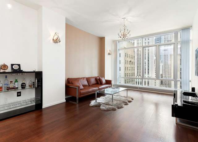 Property at 18 W 48th St Unit 16E, New York City, NY 10036, 1 bed, 1.5 baths