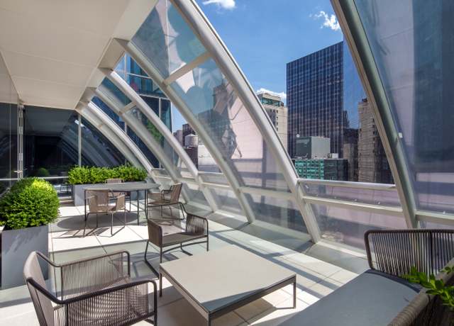 Property at 157 W 57th St Unit 32D, New York City, NY 10019, 1 bed, 1.5 baths